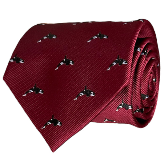 Opulent red necktie with orca pattern embroidery