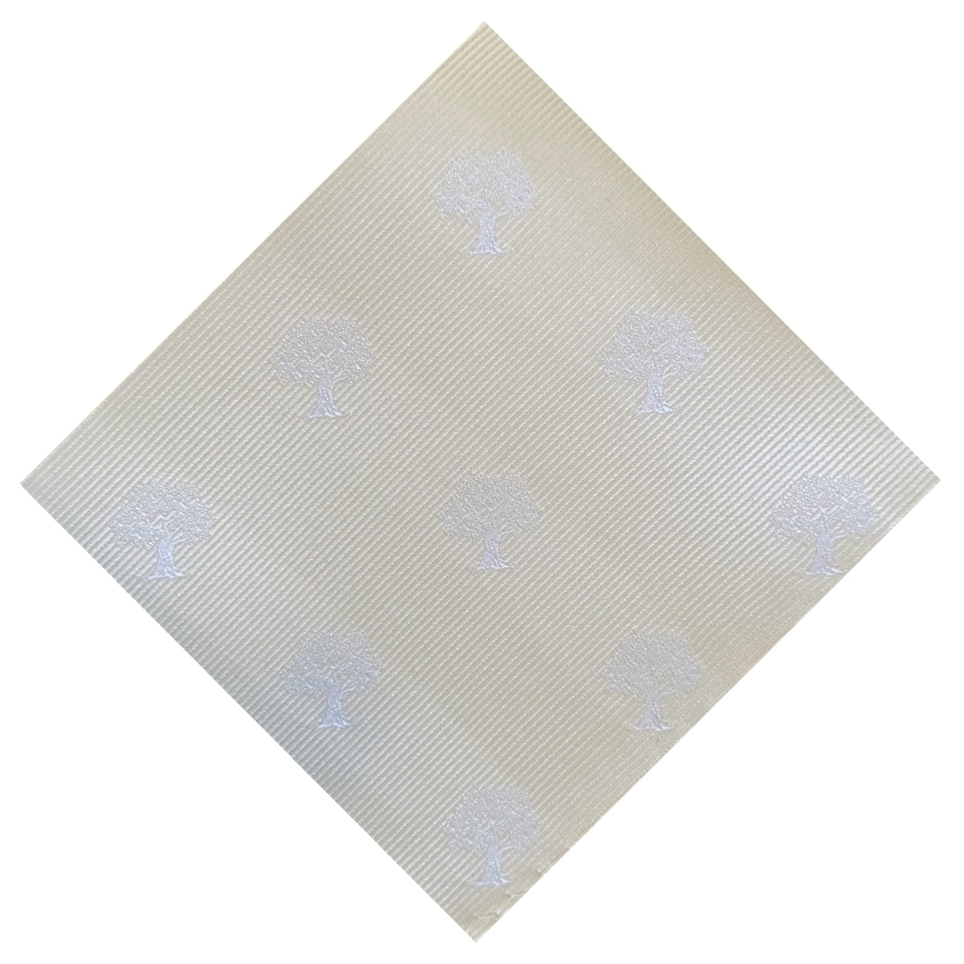 Ivory coloured pocket square with white tree embroidery throughout 